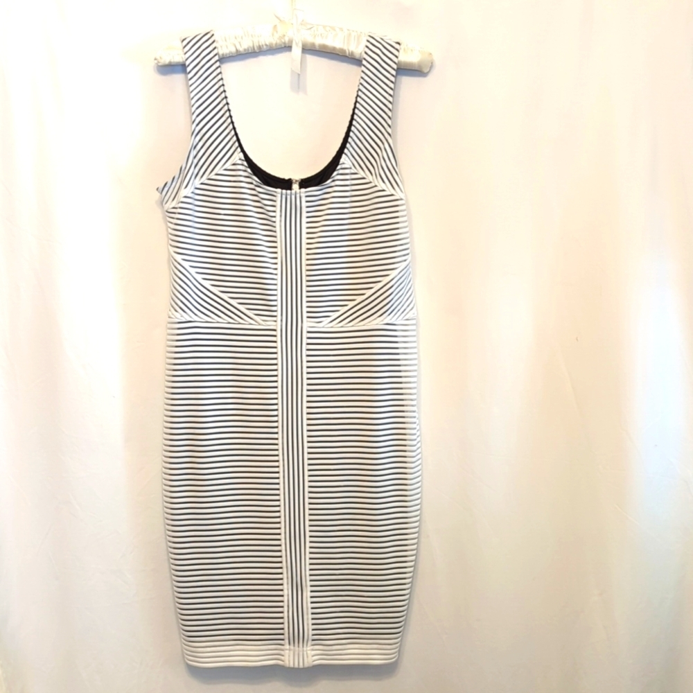 NWOT classy Guess dress.  Black with white overlay.  Size Large
